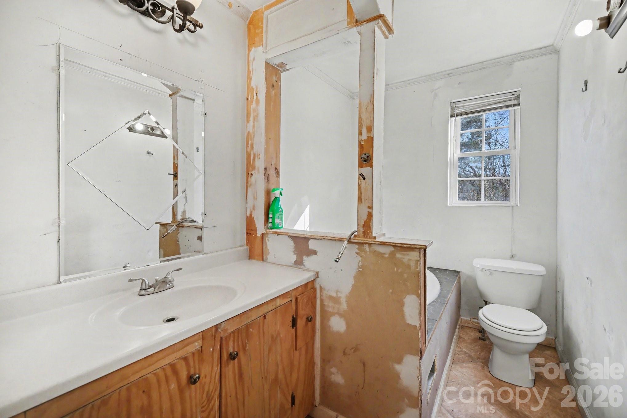 453 Robert Road Cherryville, NC 28021 - Photo 25 of 36 a bathroom with a sink toilet and shower