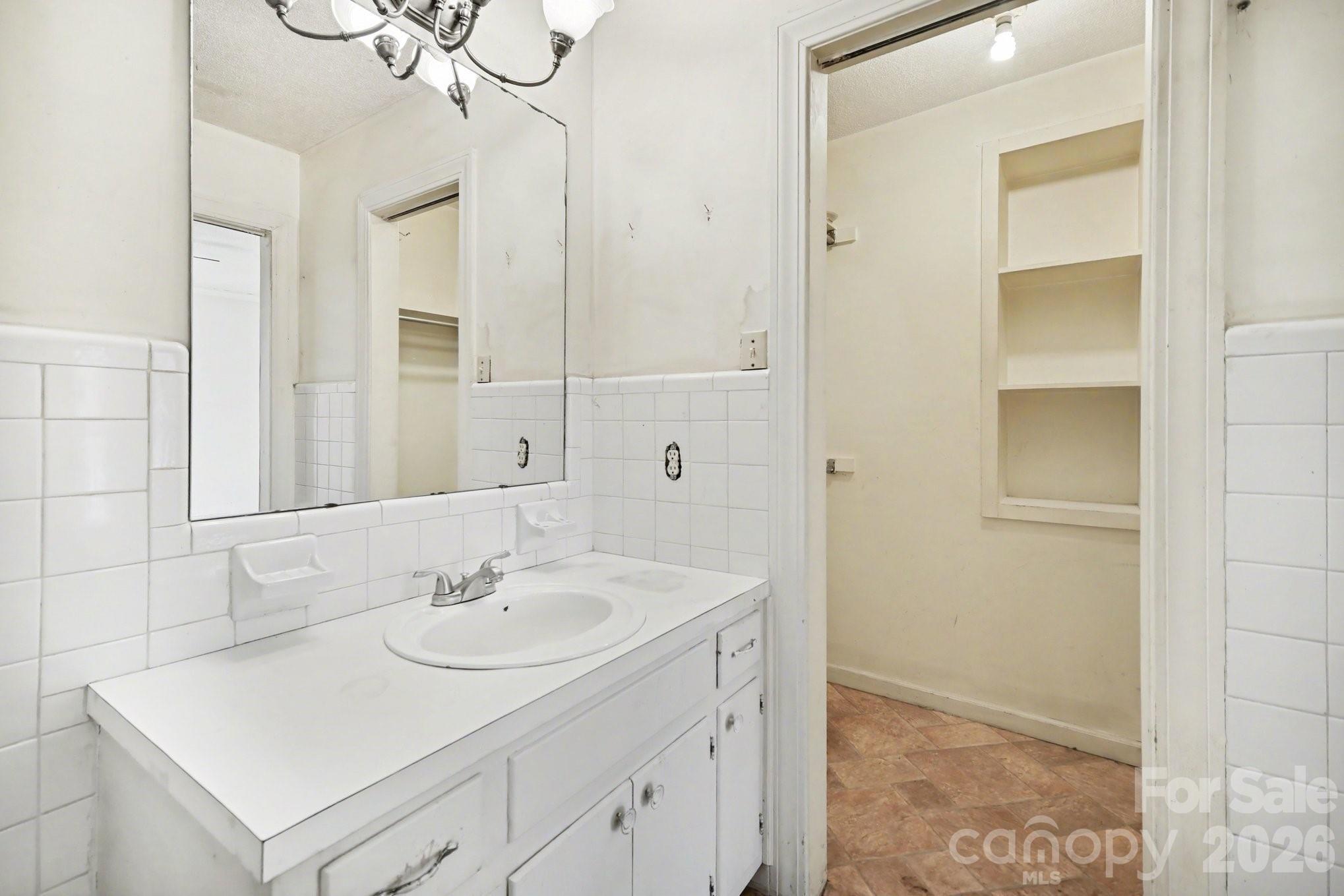 453 Robert Road Cherryville, NC 28021 - Photo 29 of 36 a bathroom with a sink and a mirror