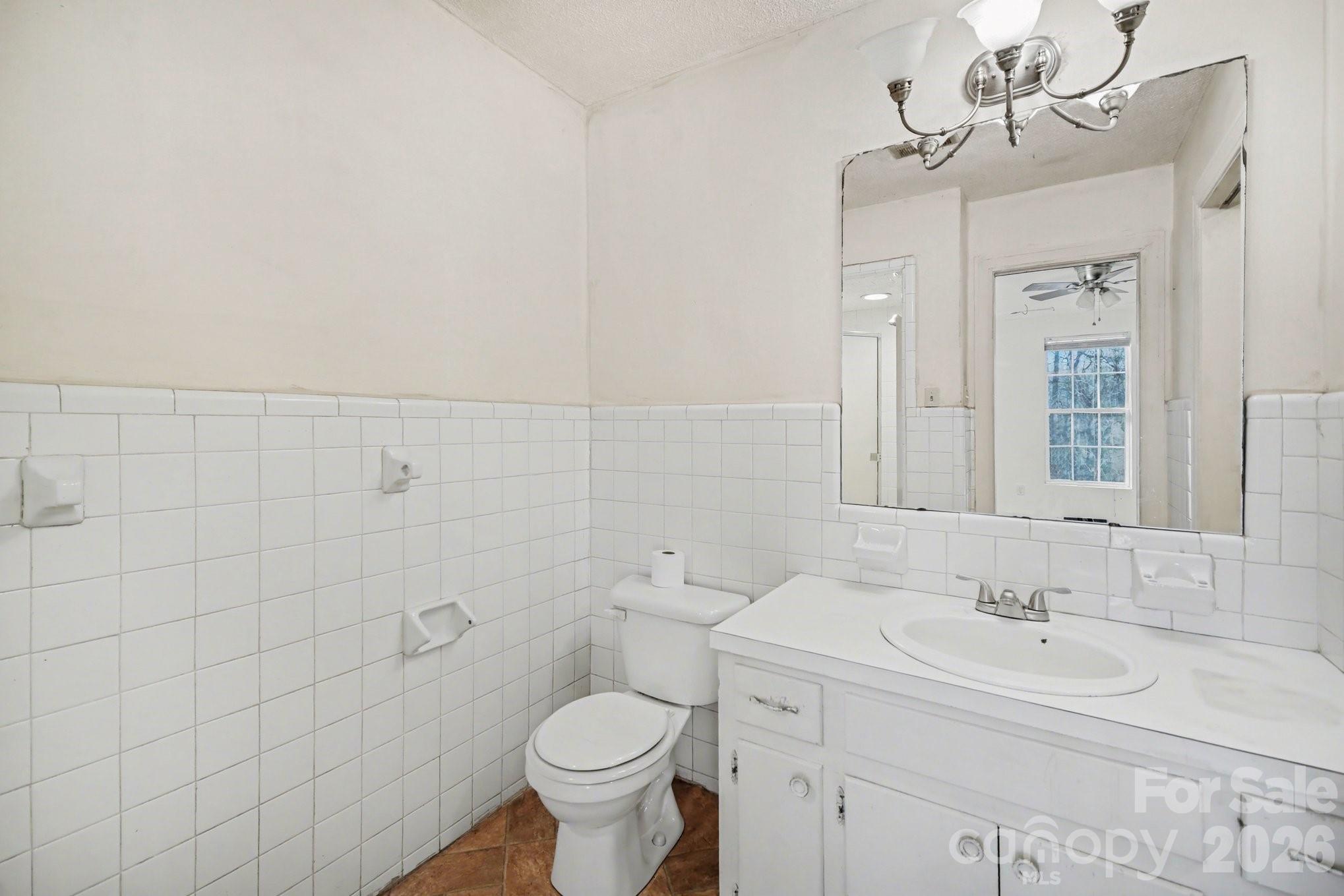 453 Robert Road Cherryville, NC 28021 - Photo 31 of 36 a bathroom with a sink a toilet and shower