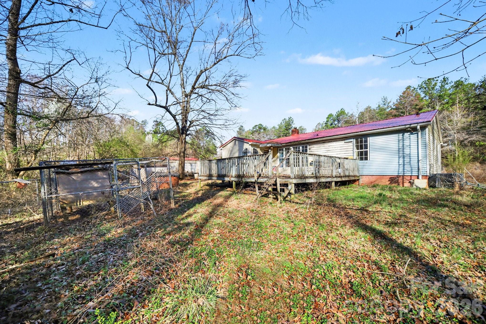 453 Robert Road Cherryville, NC 28021 - Photo 35 of 36 a view of house with outdoor space and swimming pool
