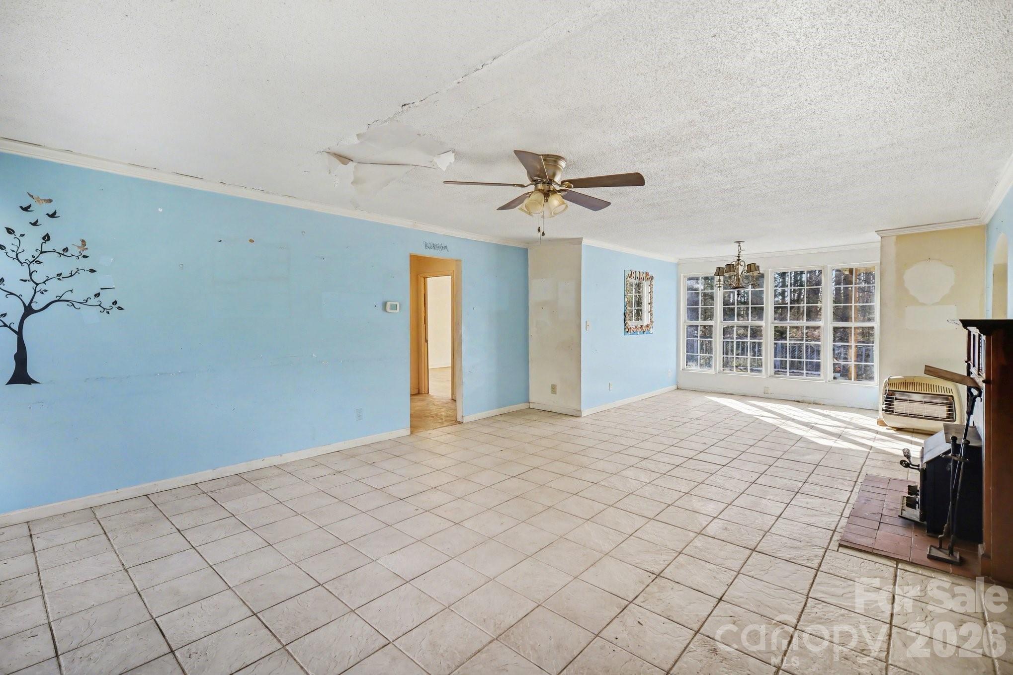 453 Robert Road Cherryville, NC 28021 - Photo 4 of 36 a view of a livingroom with furniture and windows