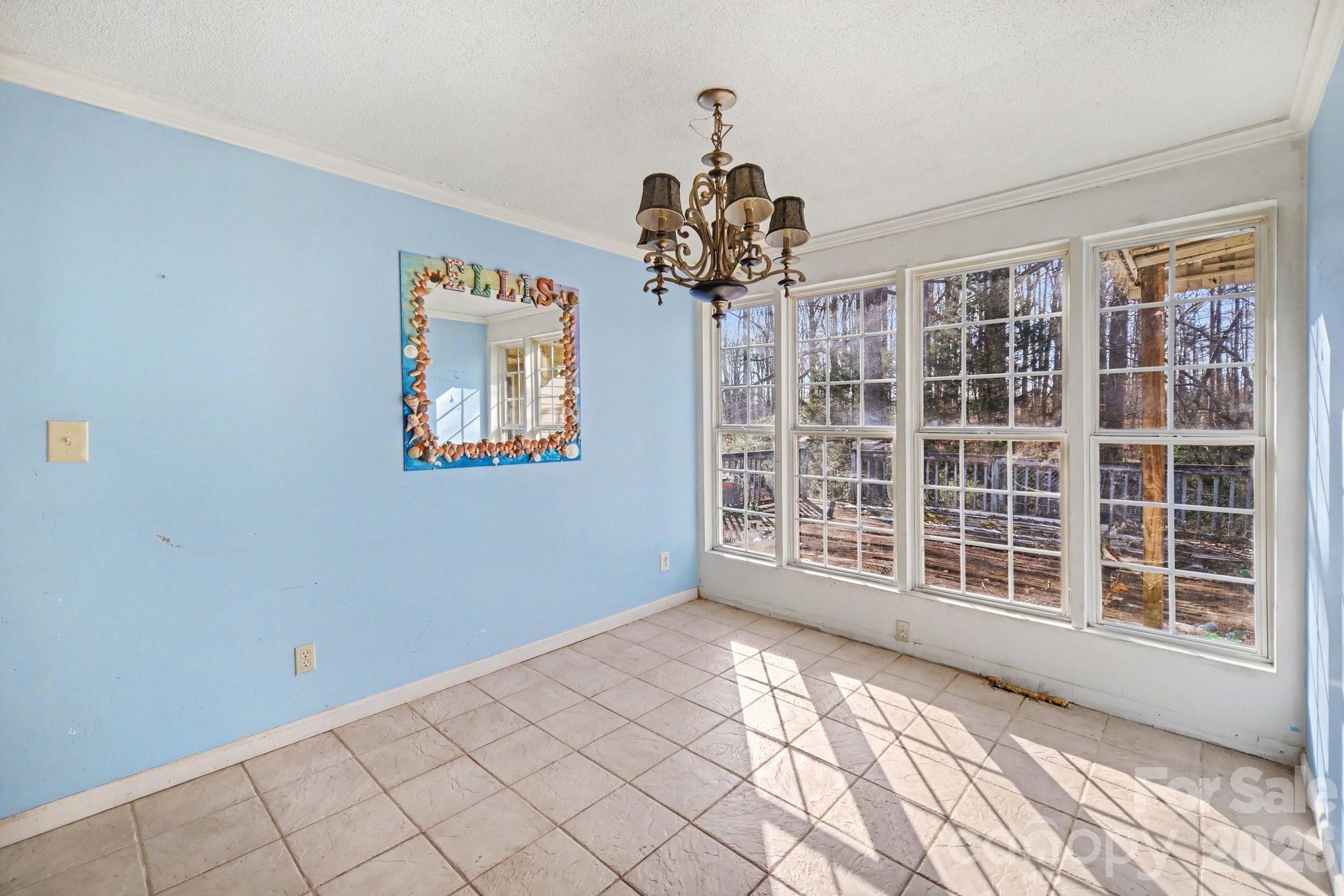 453 Robert Road Cherryville, NC 28021 - Photo 9 of 36 a view of an empty room with a window