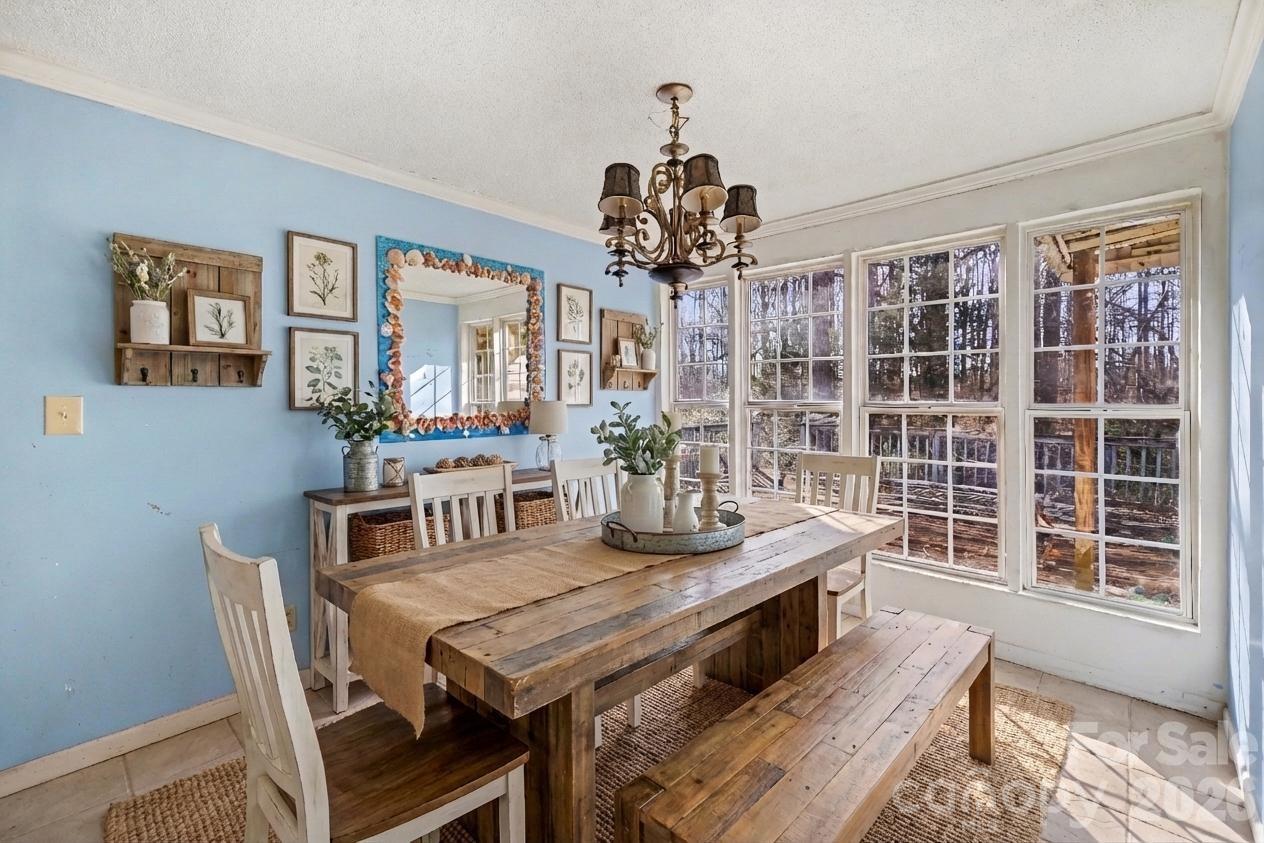 453 Robert Road Cherryville, NC 28021 - Photo 10 of 36 a view of a dining room with furniture window and outside view