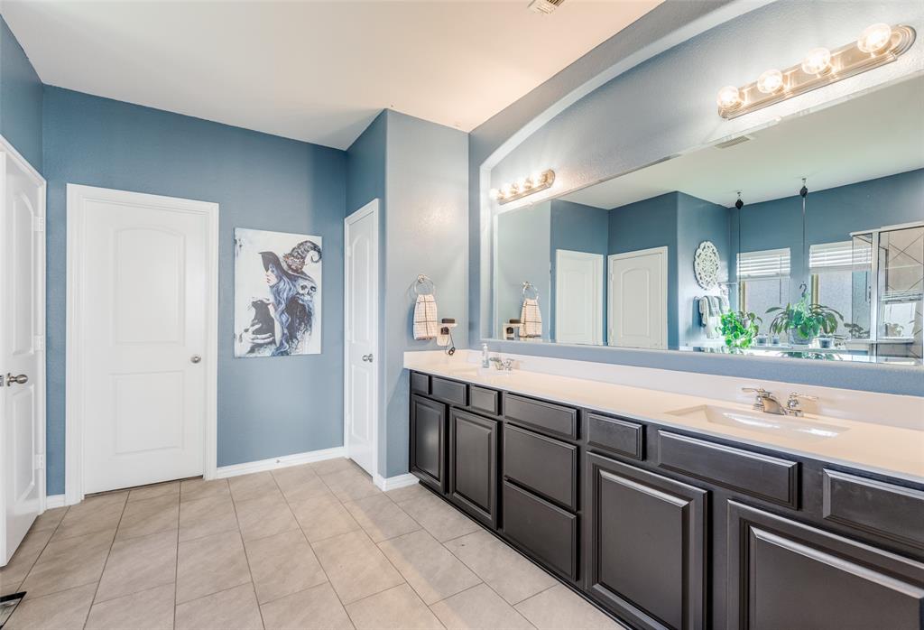 4542 Kipling Avenue Aubrey, TX 76227 - Photo 24 of 36 Full bath featuring double vanity and light tile patterned floors