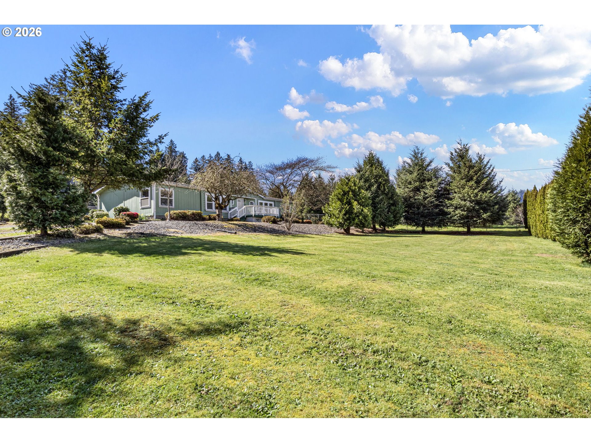 500 Elm Street Yoncalla, OR 97499 - Photo 11 of 48 a view of a yard with swimming pool and trees