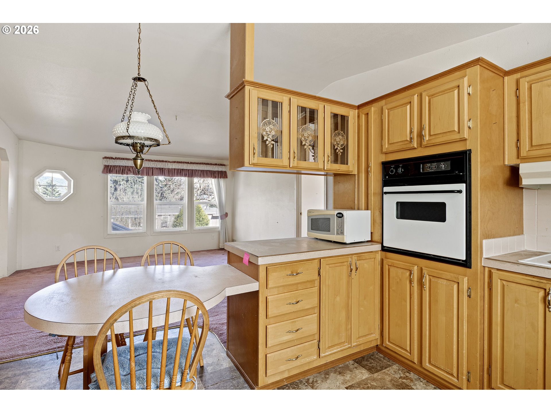 500 Elm Street Yoncalla, OR 97499 - Photo 20 of 48 a kitchen with stainless steel appliances a sink stove and cabinets