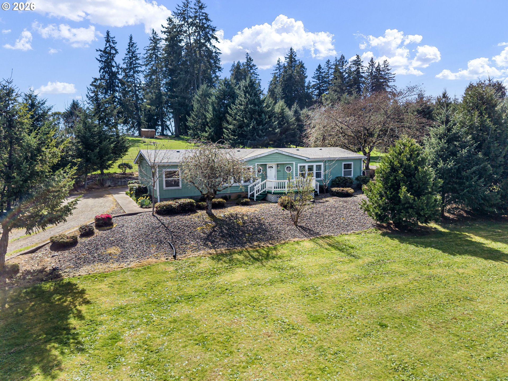 500 Elm Street Yoncalla, OR 97499 - Photo 2 of 48 an aerial view of a house with swimming pool and big yard