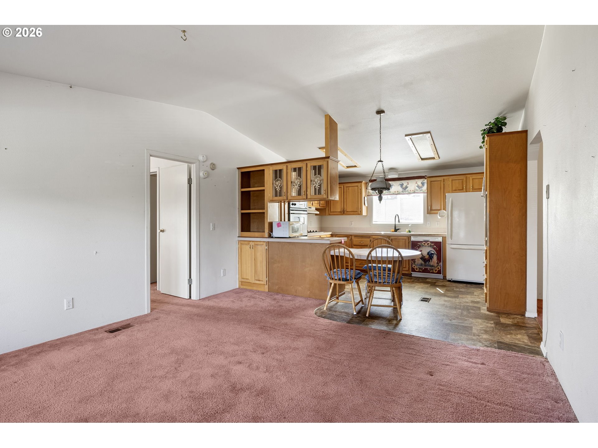 500 Elm Street Yoncalla, OR 97499 - Photo 23 of 48 a living room with stainless steel appliances kitchen island granite countertop furniture and a view of kitchen