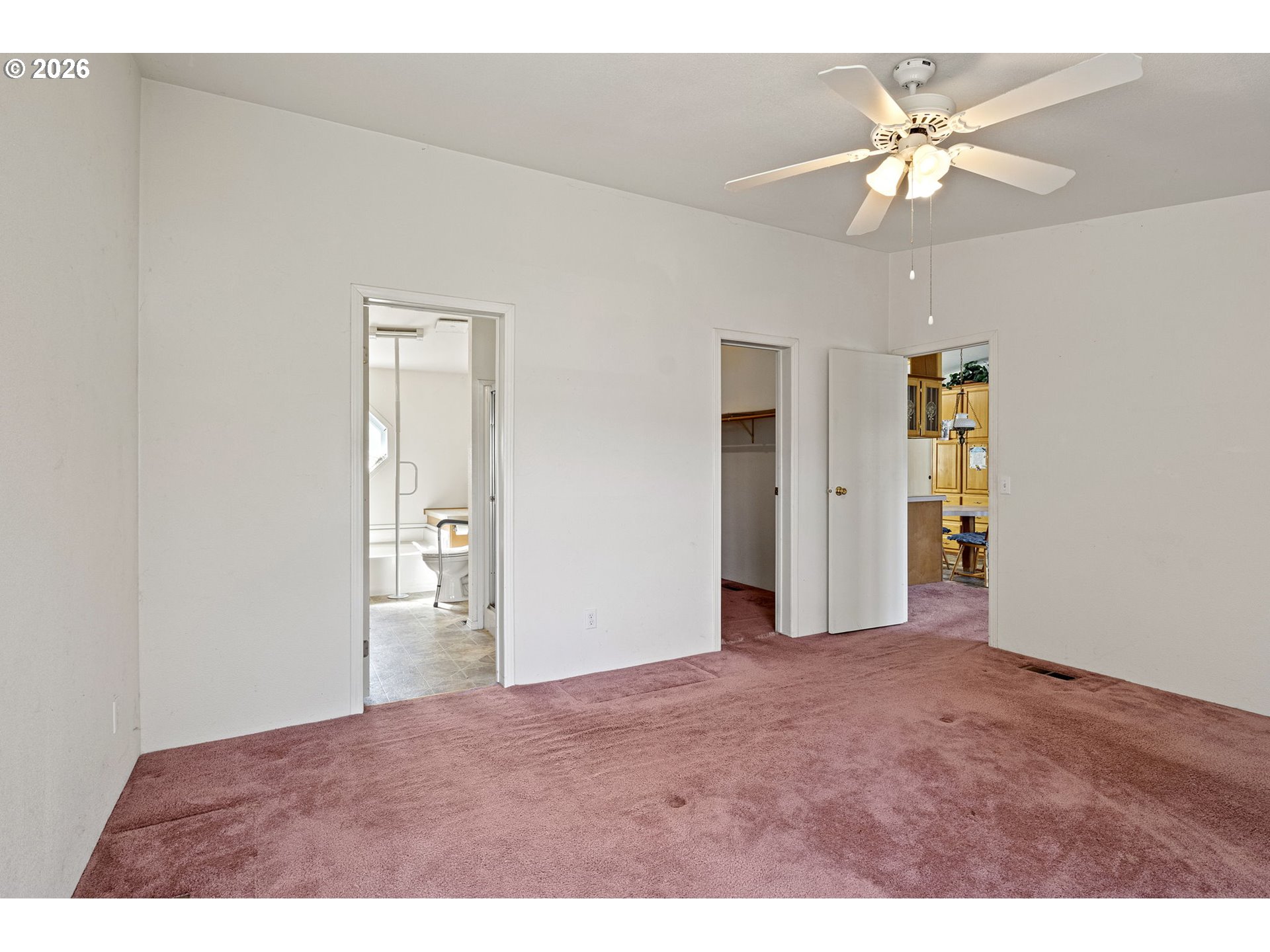 500 Elm Street Yoncalla, OR 97499 - Photo 26 of 48 a view of an empty room with chandelier fan