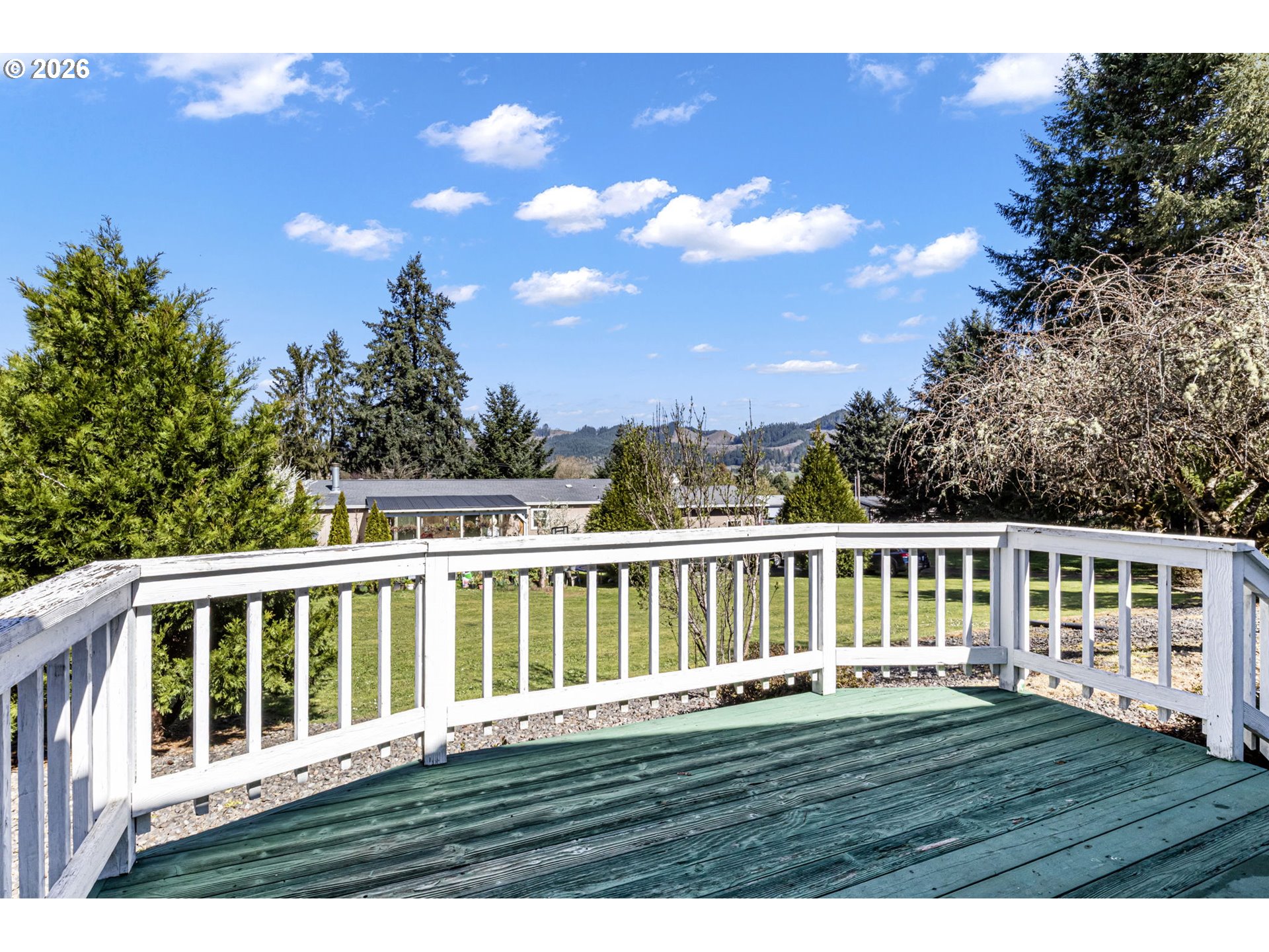 500 Elm Street Yoncalla, OR 97499 - Photo 45 of 48 a view of roof deck with wooden floor and fence