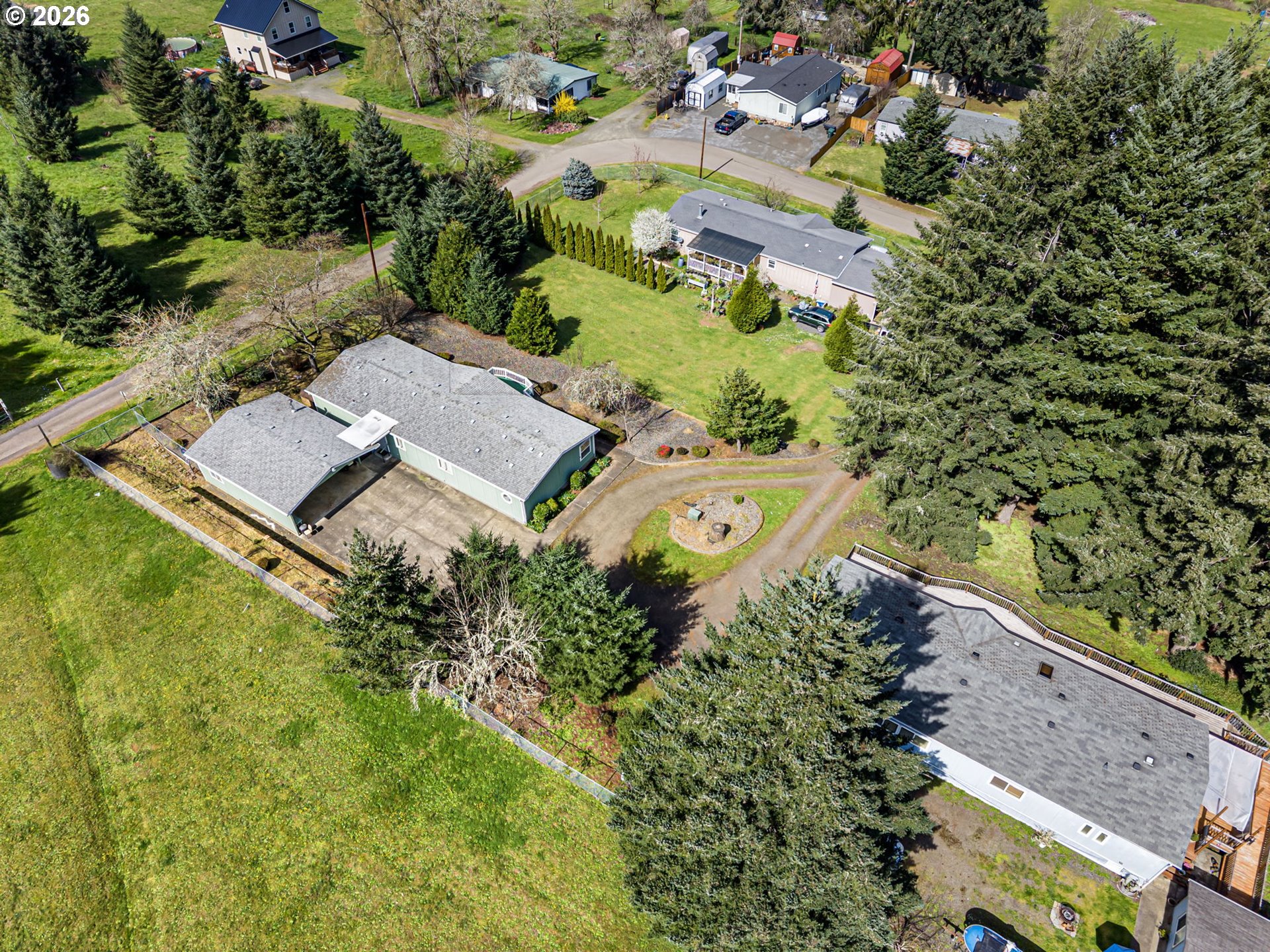 500 Elm Street Yoncalla, OR 97499 - Photo 48 of 48 an aerial view of a house with a yard