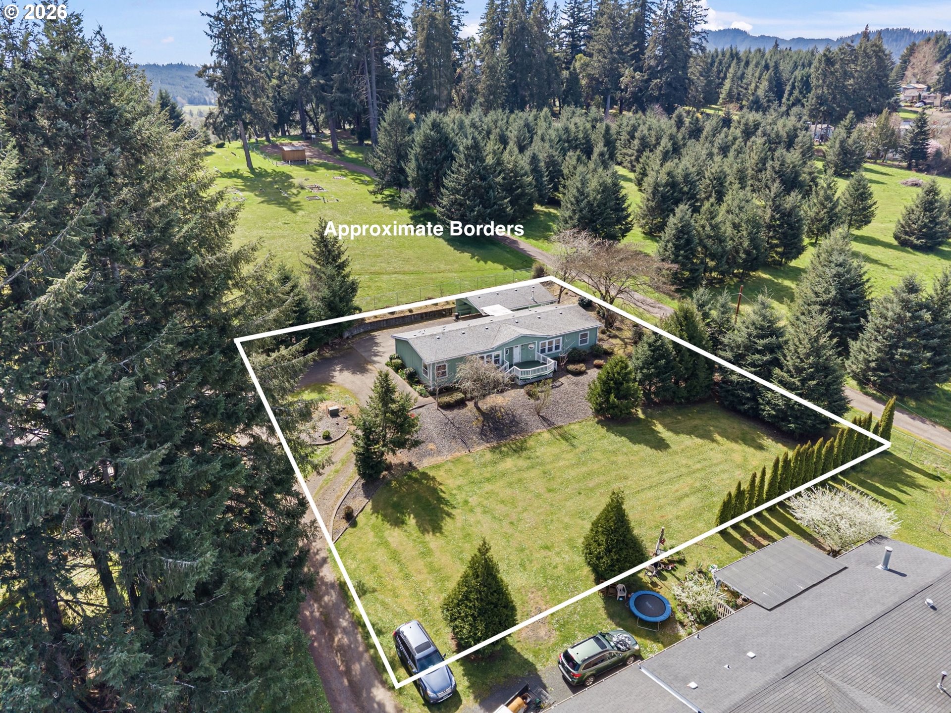 500 Elm Street Yoncalla, OR 97499 - Photo 7 of 48 a view of a yard