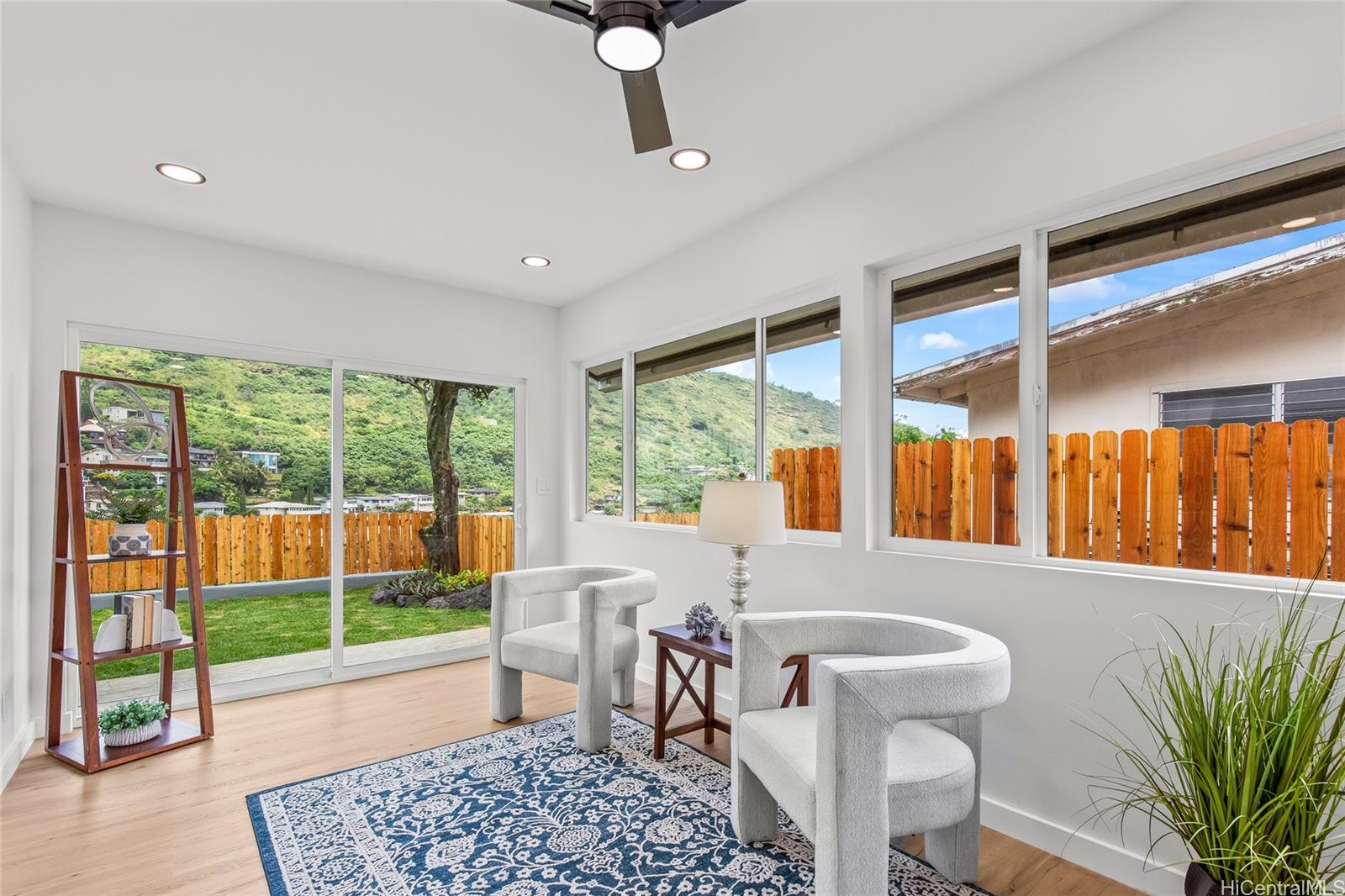 907 Ahuwale Street Honolulu, HI 96821 - Photo 10 of 25 Entertainment area/Recessed lighting/ ceiling fan, double pane sliding doors and windows