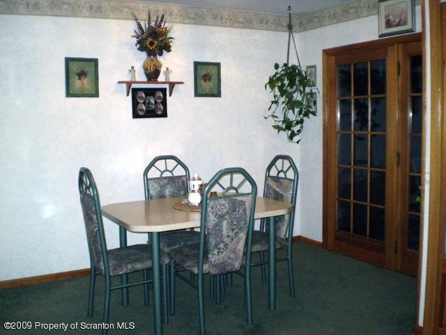 3772 Quarry Road Nicholson, PA 18446 - Photo 5 of 16 a view of a dining room with furniture and wooden floor