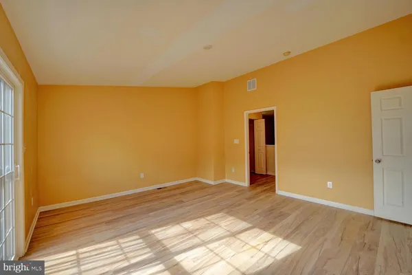 a view of livingroom with wooden floor