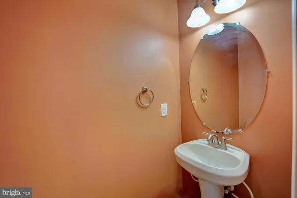 a view of a hallway with washer and dryer