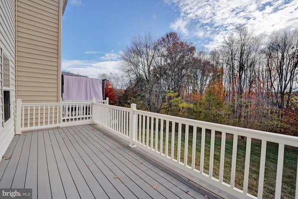 a view of a wooden roof deck