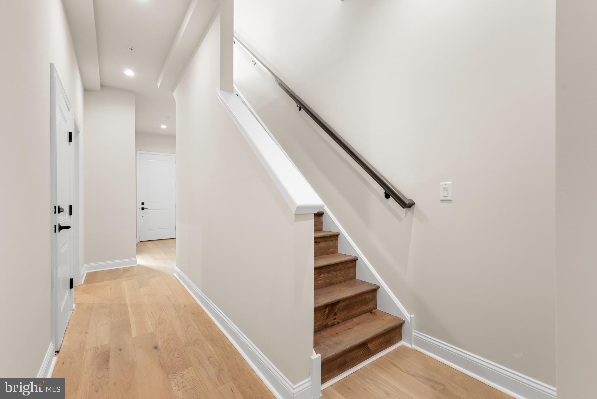 4032 (4050) Marilyn (conshohocken Ave) Drive Philadelphia, PA 19131 - Photo 16 of 42 Inviting entryway with elegant staircase.