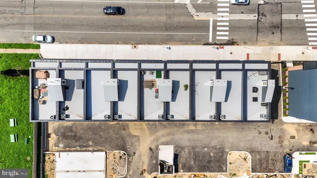a black car parked in front of a building
