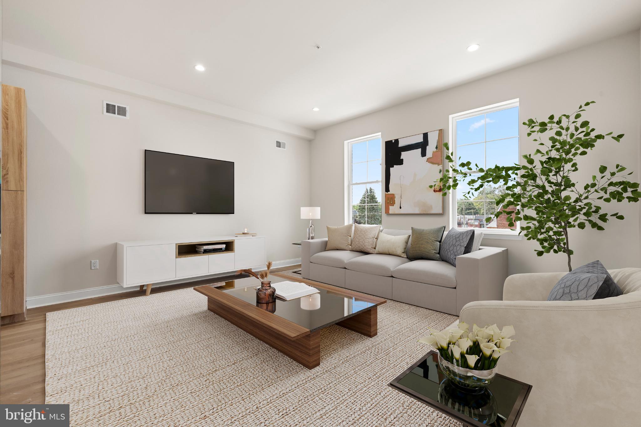 4032 (4050) Marilyn (conshohocken Ave) Drive Philadelphia, PA 19131 - Photo 3 of 42 Bright and airy modern living space.