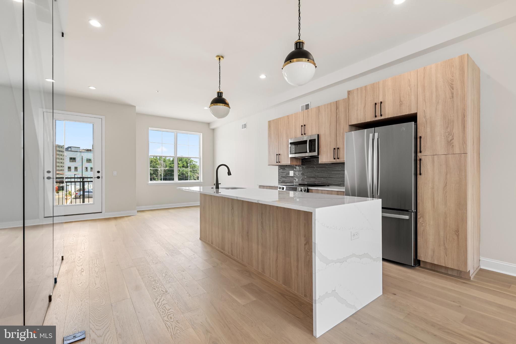 4032 (4050) Marilyn (conshohocken Ave) Drive Philadelphia, PA 19131 - Photo 35 of 42 Modern kitchen with sleek finishes.