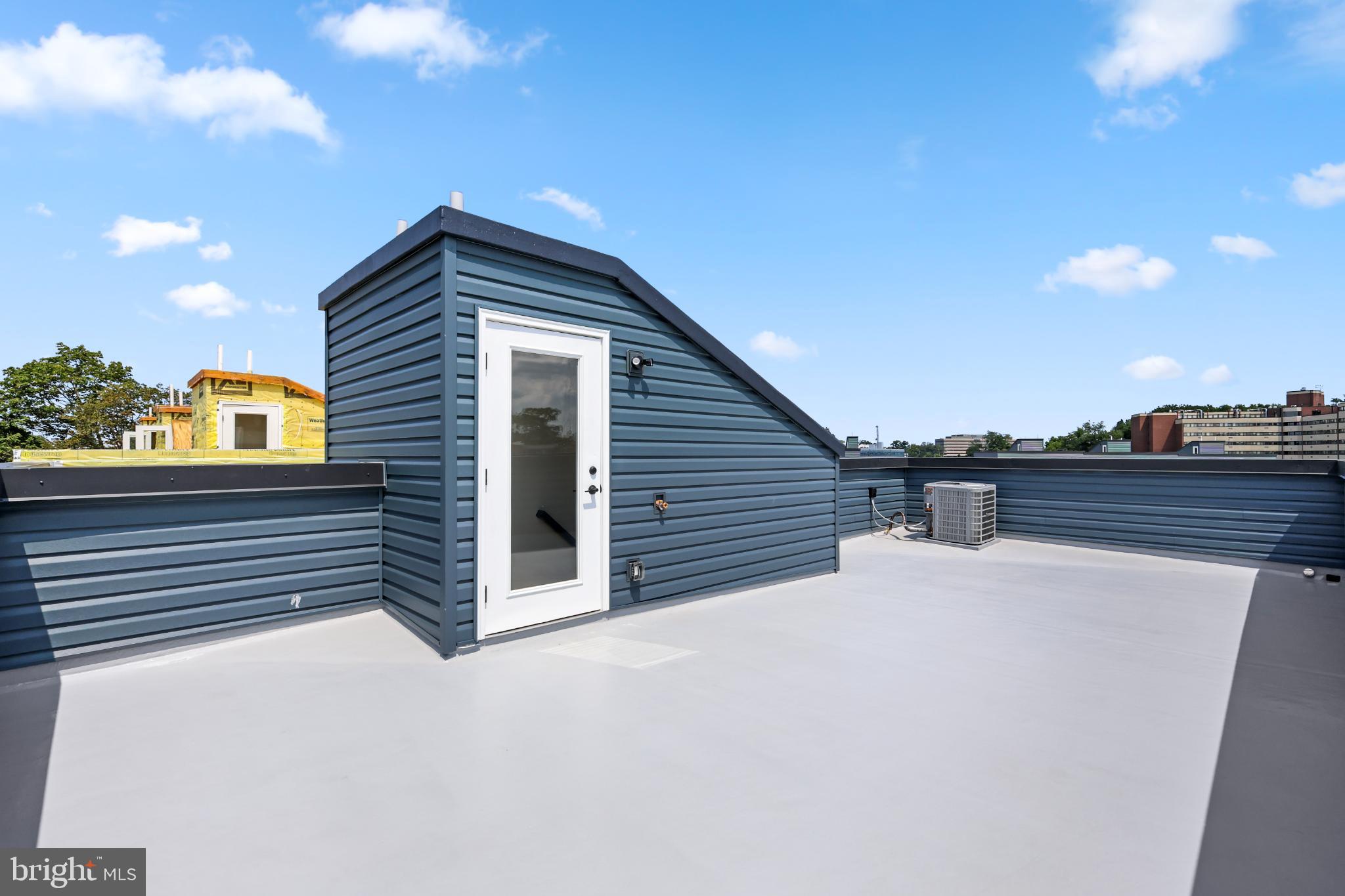 4032 (4050) Marilyn (conshohocken Ave) Drive Philadelphia, PA 19131 - Photo 42 of 42 Stylish rooftop retreat with skyline views.