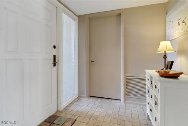 a view of a hallway with workspace