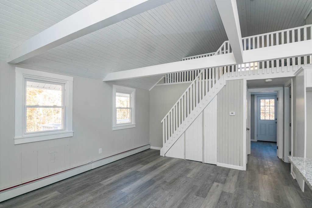 56 Ball Road Goshen, MA 01096 - Photo 21 of 33 wooden floor in an empty room with a window