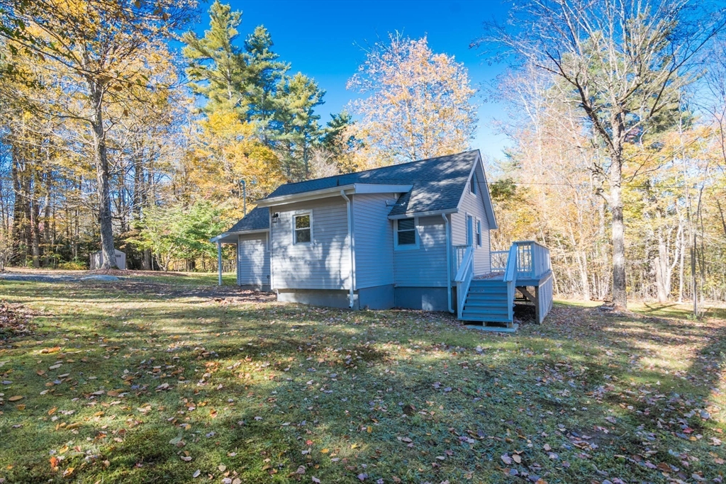 56 Ball Road Goshen, MA 01096 - Photo 4 of 33 a house view with a garden space