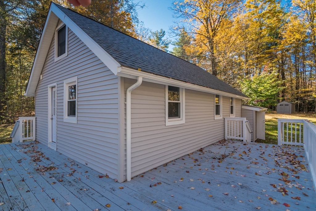 56 Ball Road Goshen, MA 01096 - Photo 7 of 33 a view of a house with a yard