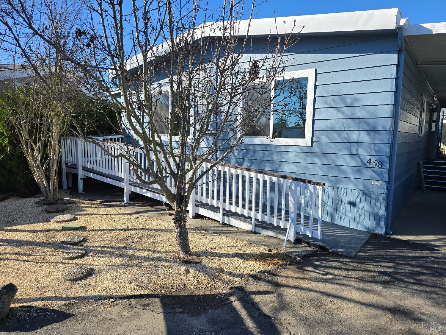 468 Colonial Park Drive Santa Rosa, CA 95403 - Photo 1 of 26 a front view of a house with a tree