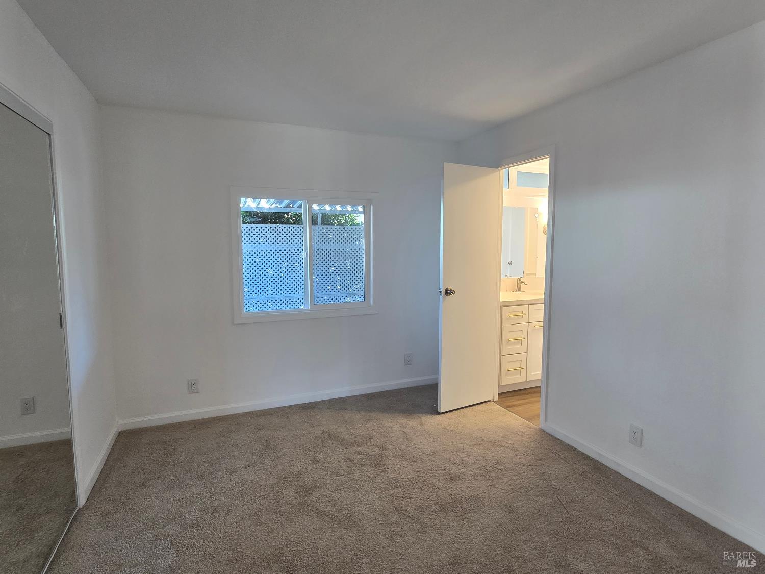 468 Colonial Park Drive Santa Rosa, CA 95403 - Photo 14 of 26 an empty room with windows and closet