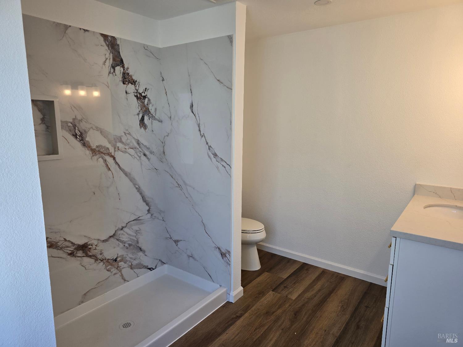 468 Colonial Park Drive Santa Rosa, CA 95403 - Photo 19 of 26 a bathroom with a sink toilet and shower