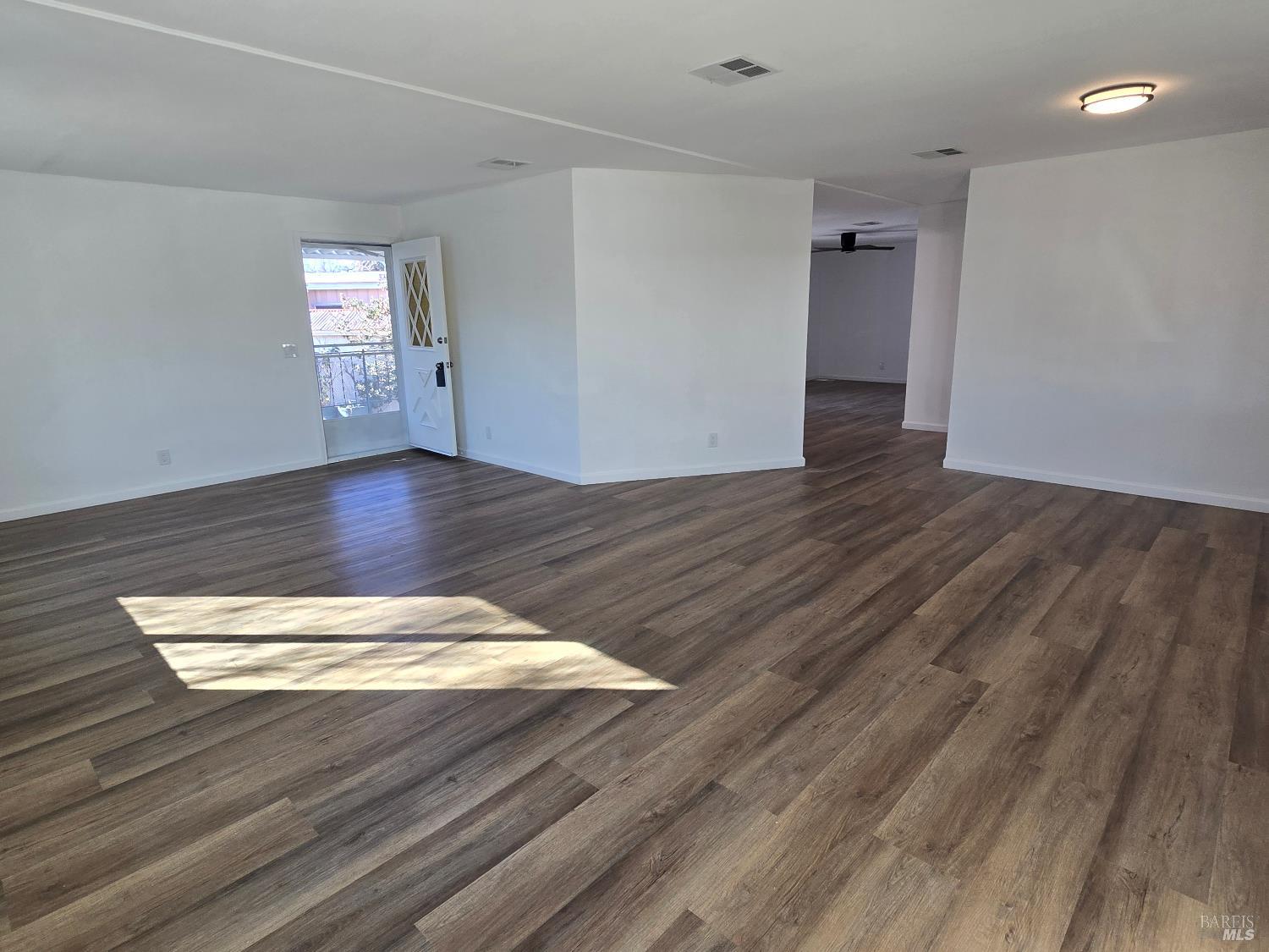 468 Colonial Park Drive Santa Rosa, CA 95403 - Photo 3 of 26 a view of an empty room and wooden floor