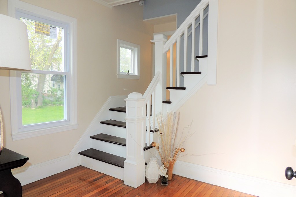 29 Dwight Road Springfield, MA 01108 - Photo 13 of 25 a view of entryway with wooden floor and stairs