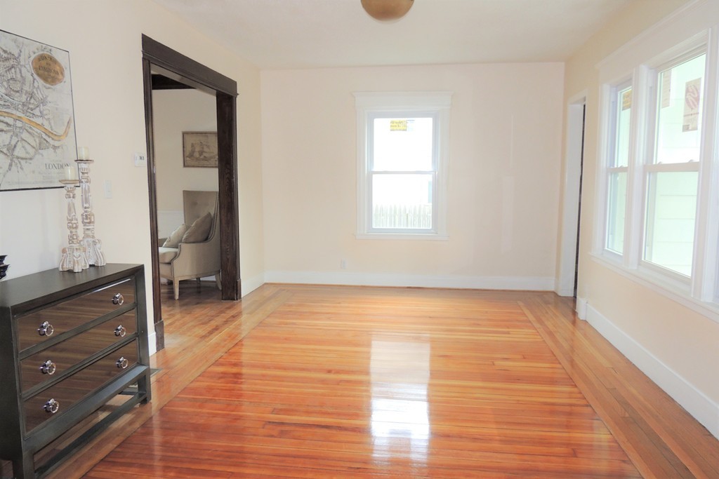 29 Dwight Road Springfield, MA 01108 - Photo 15 of 25 a view of an empty room with window and bathroom