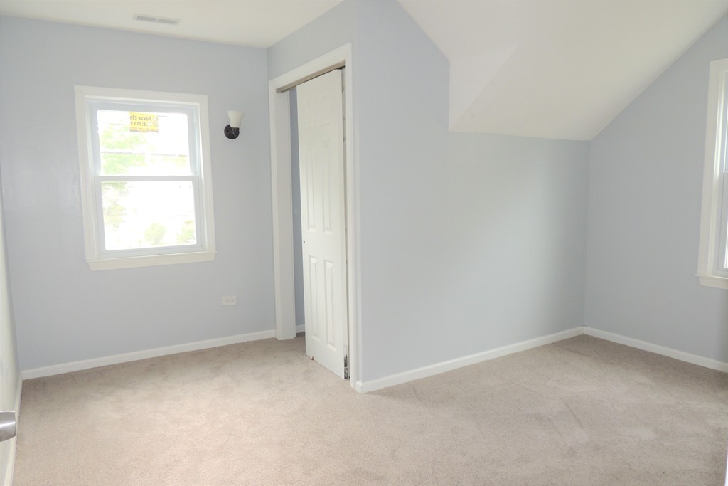 29 Dwight Road Springfield, MA 01108 - Photo 17 of 25 an empty room with a window