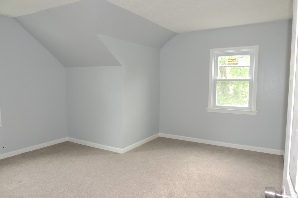 29 Dwight Road Springfield, MA 01108 - Photo 18 of 25 an empty room with a window