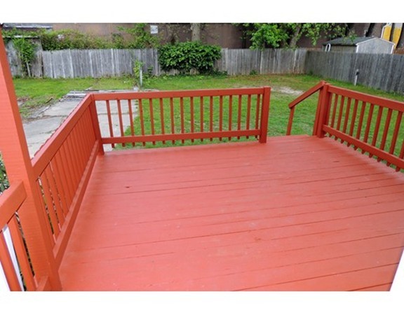 29 Dwight Road Springfield, MA 01108 - Photo 23 of 25 a view of deck with wooden floor and fence