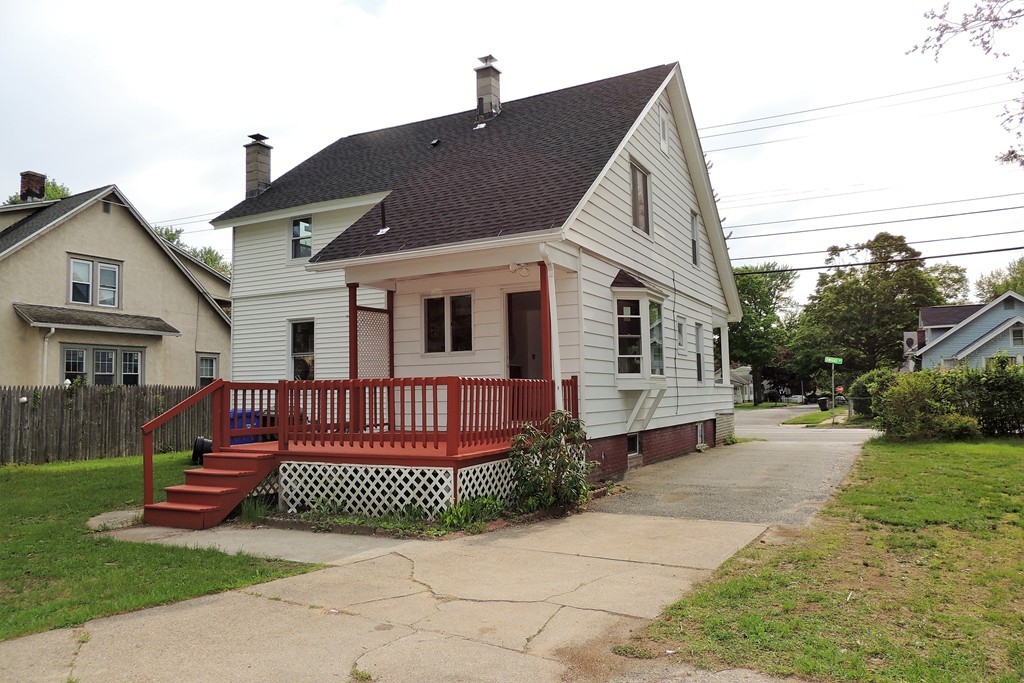 29 Dwight Road Springfield, MA 01108 - Photo 25 of 25 a front view of a house with a garden