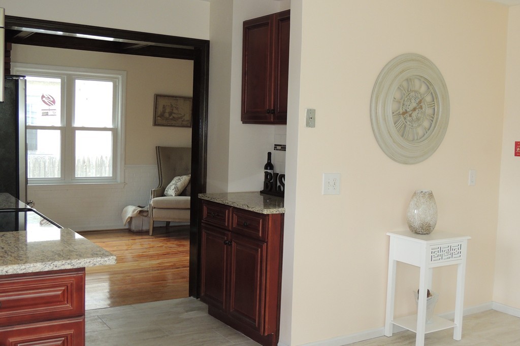 29 Dwight Road Springfield, MA 01108 - Photo 6 of 25 a living room with furniture and a window