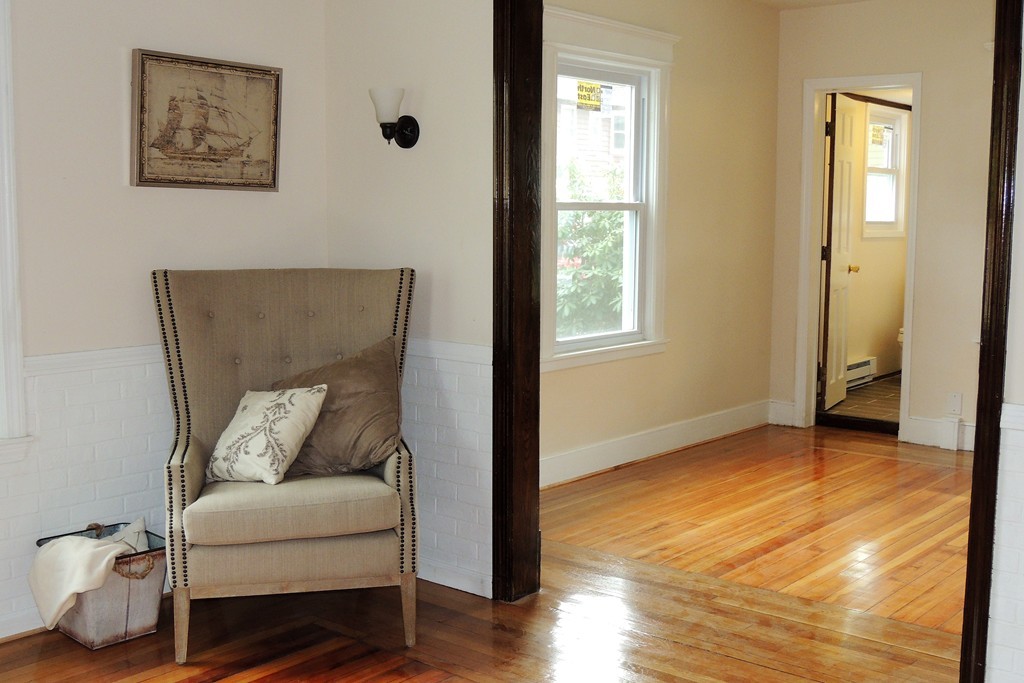 29 Dwight Road Springfield, MA 01108 - Photo 7 of 25 a living room with furniture and a window