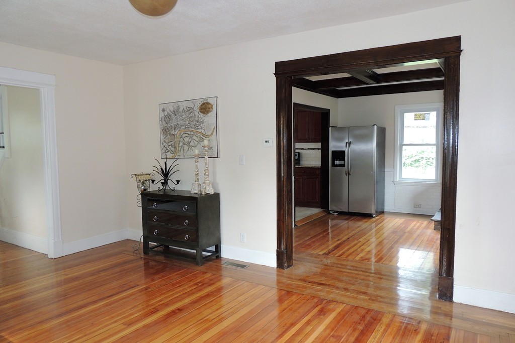 29 Dwight Road Springfield, MA 01108 - Photo 9 of 25 a view of a room with wooden floor and closet