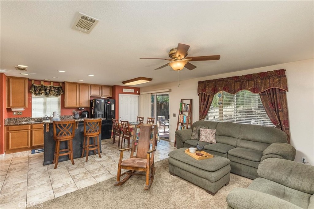 28984 Escalante Road Menifee, CA 92587 - Photo 6 of 40 Family room open to kitchen