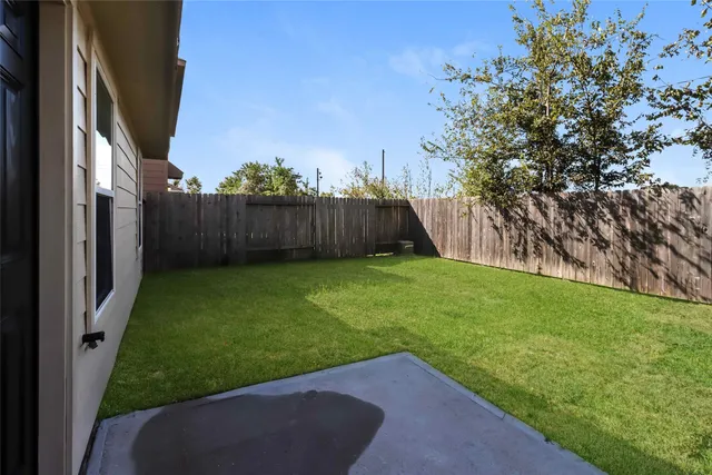 a view of a backyard with garden