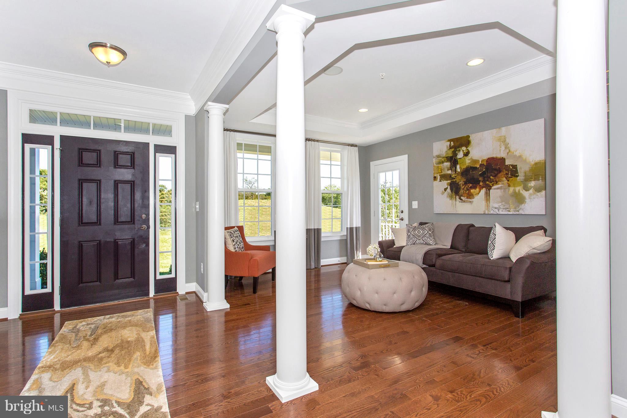 2112 Gable Drive Jessup, MD 20794 - Photo 13 of 27 a living room with furniture and a wooden floor