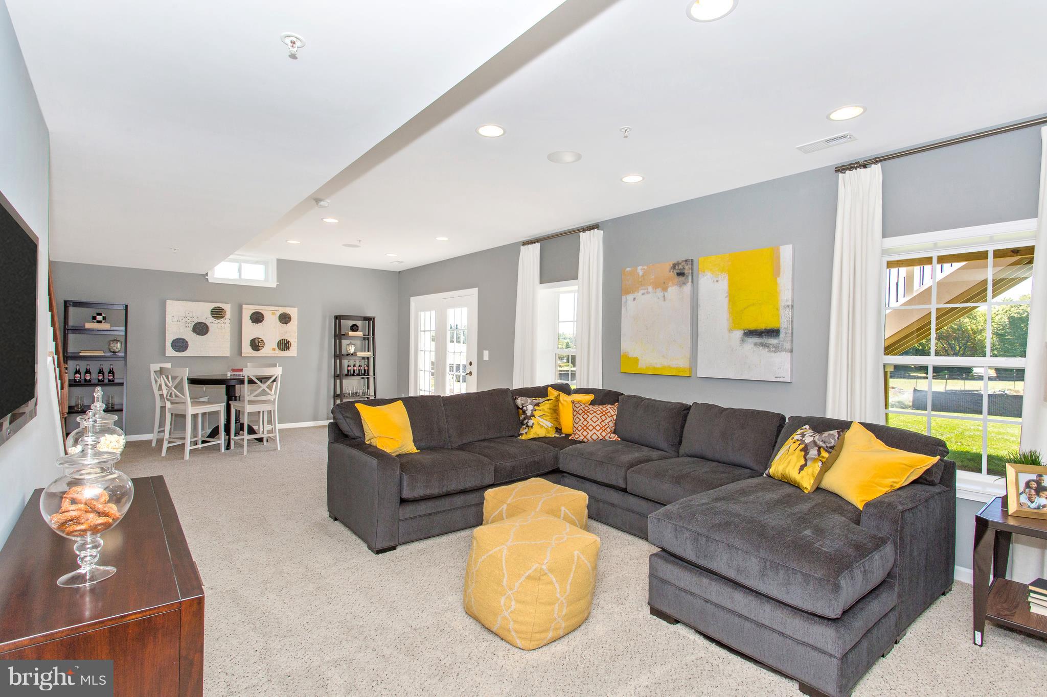 2112 Gable Drive Jessup, MD 20794 - Photo 22 of 27 a living room with furniture and a large window
