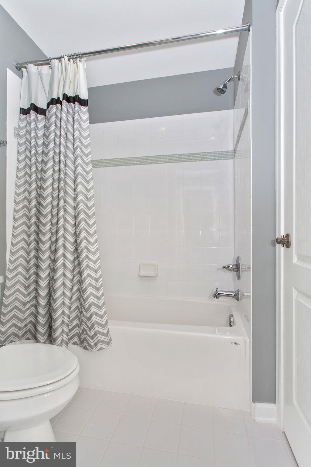 2112 Gable Drive Jessup, MD 20794 - Photo 4 of 27 a bathroom with a toilet and shower