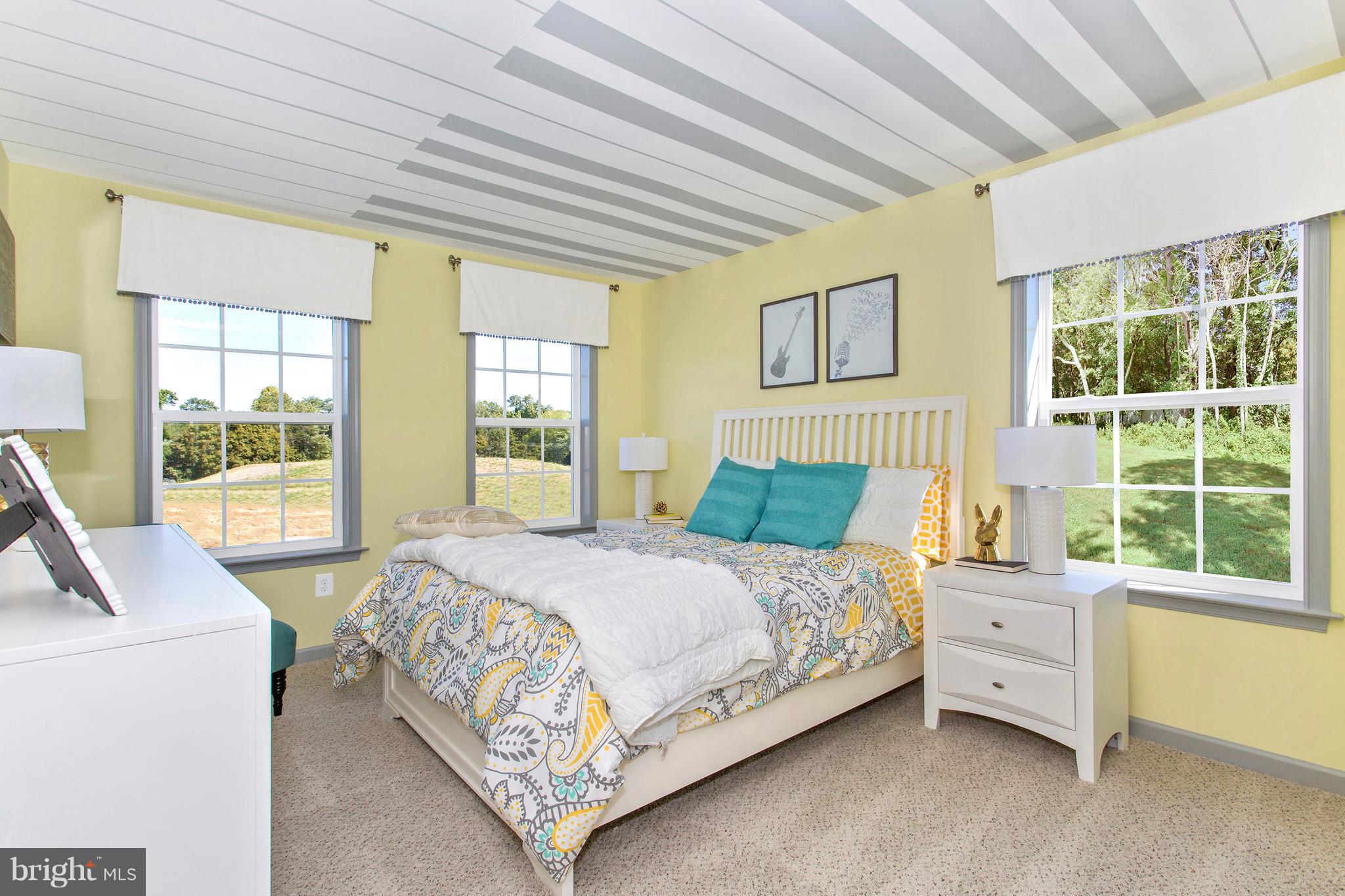 2112 Gable Drive Jessup, MD 20794 - Photo 6 of 27 a bedroom with a bed and a large window