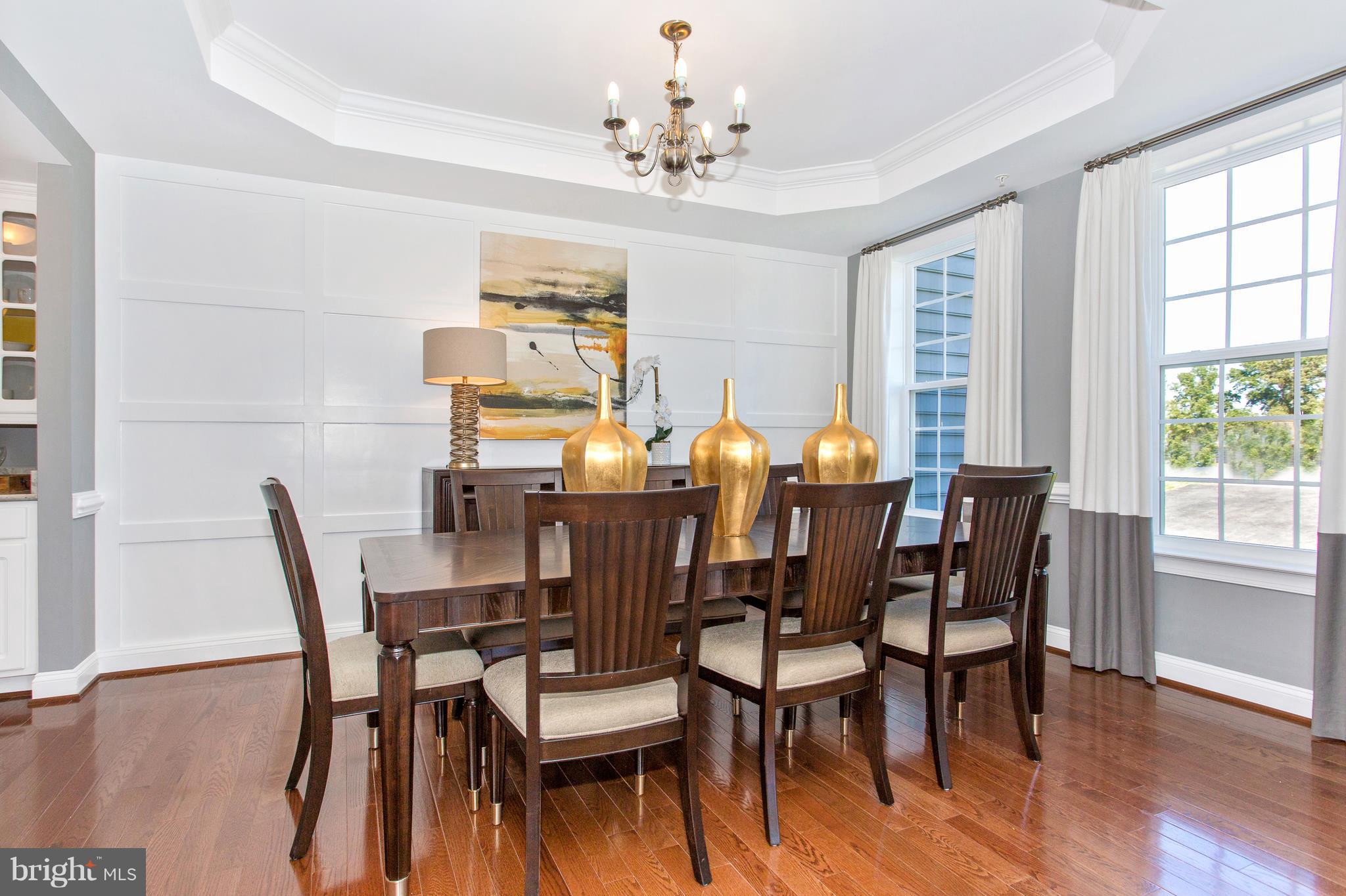 2112 Gable Drive Jessup, MD 20794 - Photo 7 of 27 a view of a dining room with furniture and wooden floor